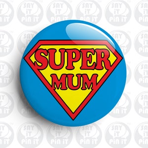 May include: A blue and red button with a yellow superhero logo that says "SUPER MUM" in red letters.