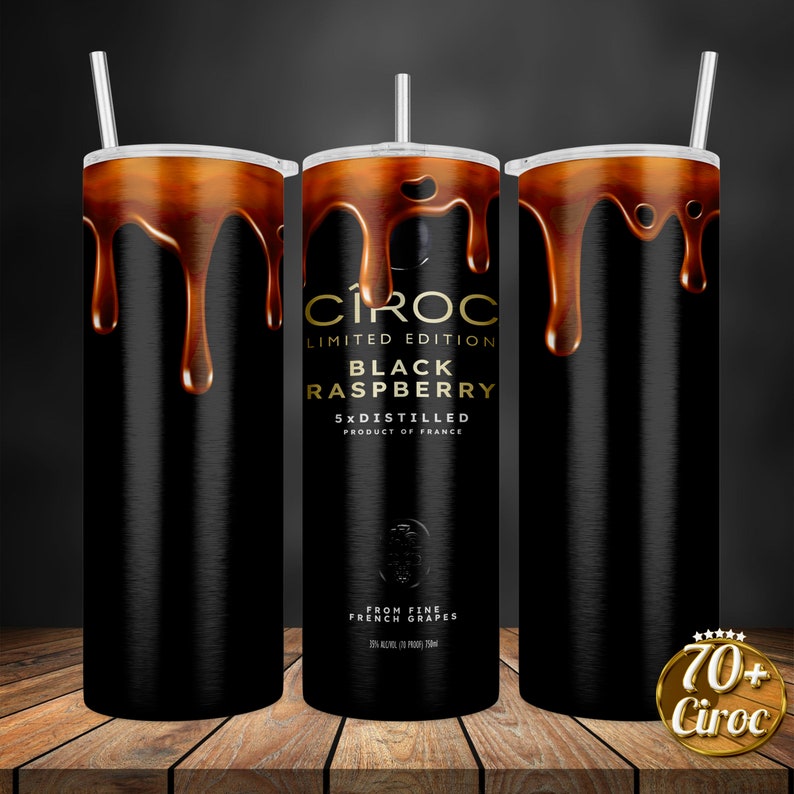 May include: Three black stainless steel tumblers with a gold metallic finish and a dripping gold liquid design. The center tumbler features the C&Icirc;ROC logo and the text "LIMITED EDITION BLACK RASPBERRY 5X DISTILLED PRODUCT OF FRANCE FROM FINE FRENCH GRAPES 20% ALC/VOL 70 PROOF 750ml" in gold lettering. The bottom of the image features a gold circle with the text "70+ C&Icirc;ROC" in black lettering.