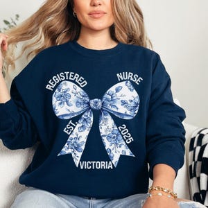 Blue Toile Nurse Bow Sweatshirt, Coquette Nurse Shirt, Gift For Nurse, Nurse Ribbon Hoodie, Registered Nurse Shirt, Floral Nurse Hoodie