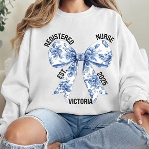 Blue Toile Nurse Bow Sweatshirt, Coquette Nurse Shirt, Gift For Nurse, Nurse Ribbon Hoodie, Registered Nurse Shirt, Floral Nurse Hoodie