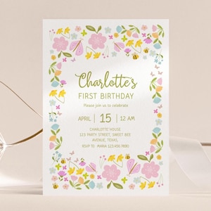May include: A floral-themed invitation for Charlotte's first birthday. The invitation features a border of pink flowers, butterflies, and bees. The text reads "Charlotte's First Birthday" with the date April 15 and the time 12 AM.