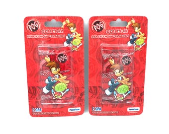 2 blísteres de Pogs sin abrir de la Global Pog Association, World Pog Federation