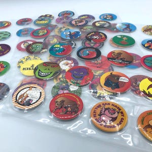 Vintage 90’s Pogs Stack n’ Smack Milkcaps in Protective Pog Pages