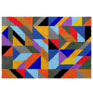 May include: A colorful geometric rug with a patchwork design featuring triangles in shades of red, orange, yellow, green, blue, purple, and black.