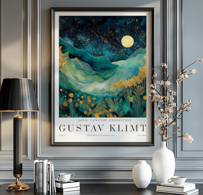 May include: A framed art print featuring a landscape painting with teal and gold tones, a full moon, and a starry night sky. The print is labeled "20TH CENTURY EXHIBITION GUSTAV KLIMT GOLD HISTORY OF AUSTRIAN ART AUSTRIA."