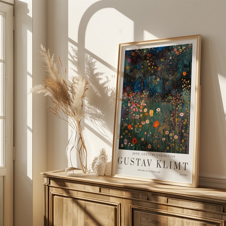 May include: A framed poster with a painting of a field of flowers in shades of red, yellow, and white against a dark green and blue background. The poster is titled "Gustav Klimt" and features the text "20th Century Exhibition" and "History of Austrian Art".