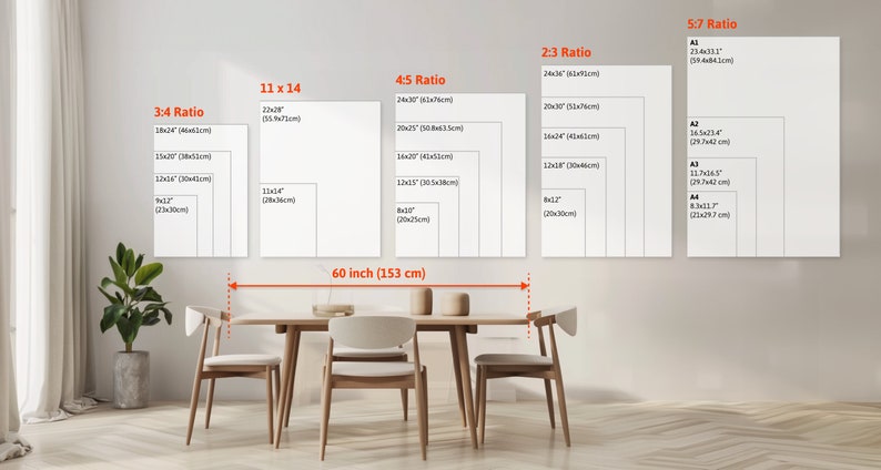 May include: A white wall with a variety of different sized rectangular frames, each with a different aspect ratio, labeled with the ratio and measurements in inches and centimeters. The frames are arranged in a row from left to right, with the largest frame on the right. The frames are all white and have a simple, modern design. The wall is painted a light gray color. A wooden table with four chairs is in front of the wall. The table is made of light wood and has a simple, modern design. The chairs are also made of light wood and have a simple, modern design. The chairs are all facing the table. The table and chairs are in a room with a light gray floor. The room is well-lit and has a modern, minimalist design.