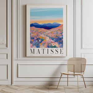 May include: A colorful poster with a landscape scene of a field of flowers and mountains in the background. The text "MATISSE" is printed in bold, black letters at the bottom of the poster.