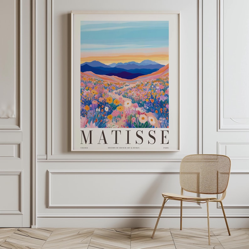 May include: A colorful poster with a landscape scene of a field of flowers and mountains in the background. The text "MATISSE" is printed in bold, black letters at the bottom of the poster.