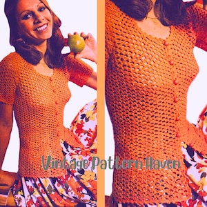 May include: Orange crochet top with short sleeves and a button-up front. The top has a V-neck and is paired with a floral skirt. The text "Vintage Pattern Haven" is visible at the bottom of the image.