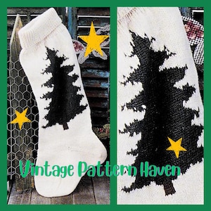 May include: A cream-coloured knitted Christmas stocking featuring a black tree motif. The stocking has a ribbed cuff and a rounded toe. The text "Vintage Pattern Haven" is visible at the bottom of the stocking.