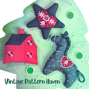 May include: Handmade Christmas ornaments in the shape of a house, star, and horse. The ornaments are red, black, and green with white floral patterns. The text "Vintage Pattern Haven" is at the bottom.