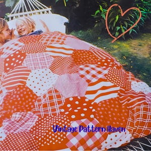May include: A red and white patchwork quilt featuring diverse patterns like polka dots, stripes, and gingham. The quilt is draped over a hammock. The text "Vintage Pattern Haven" is visible on the quilt.