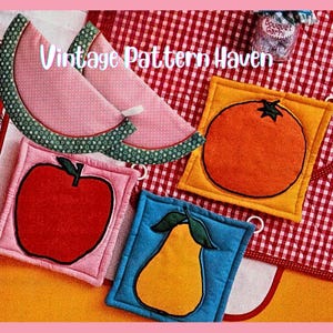 May include: A collection of colorful, handmade fabric pot holders in various fruit shapes. Includes watermelon, apple, orange, and pear designs. The text "Vintage Pattern Haven" is displayed in a cursive font.