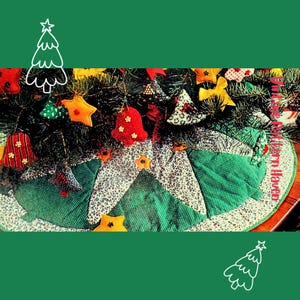 May include: A festive Christmas tree skirt featuring a green and white patterned design. The skirt is adorned with colourful star and bell ornaments. The overall theme is festive and holiday-themed.