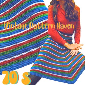 May include: A crochet skirt with blue, red, green, and white stripes. The skirt is being worn by a person with long brown hair. The text "Vintage Pattern Haven 70s" is visible in the image.