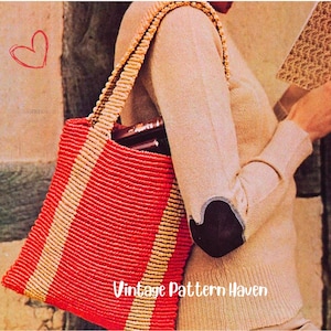 May include: A red and cream striped tote bag with a woven design. The bag has a rectangular shape and a matching woven handle. The text "Vintage Pattern Haven" is visible on the bottom of the bag.
