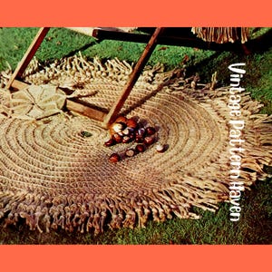 May include: A round, beige rug with a spiral design and fringe. The rug is on green grass, with a wooden chair leg and chestnuts scattered on it. The text "Vintage Pattern Haven" is visible on the right side.