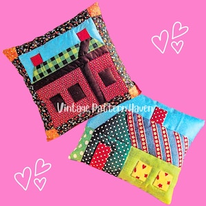 May include: Two patchwork house design throw pillows. One has a red house with a green and black checkered roof, the other a blue roof and green polka dots. The pillows have floral and patterned borders. The text "Vintage Pattern Haven" is visible.