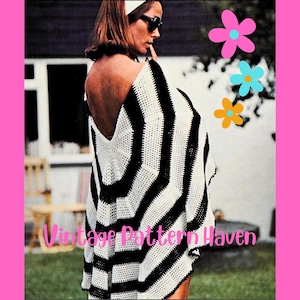 May include: A black and white striped crochet top with a deep V-neck and a loose fit. The top is crocheted in a simple pattern and has a relaxed, bohemian style. The model is wearing the top with a white headband and sunglasses.