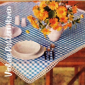 May include: A table setting with a blue and white checkered tablecloth, white plates, and silverware. A vase of orange flowers sits in the center. The tablecloth has a white lace trim. Text on the left side reads "Vintage Pattern Haven."