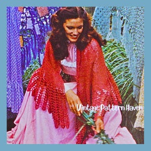 May include: A woman wearing a red crocheted shawl over a pink dress. The shawl has a scalloped edge and is draped over the shoulders. The image has the text "Vintage Pattern Haven".