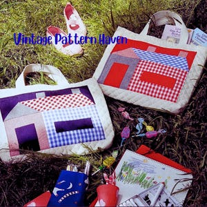 May include: Two quilted tote bags with house-shaped patchwork designs in red, blue, and gray. The bags are on a bed of grass, along with children's drawings, candy, and a pair of red shoes. The text "Vintage Pattern Haven" is visible.