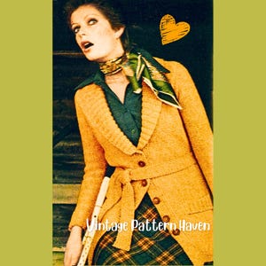 May include: A vintage image of a woman wearing a mustard yellow cardigan with a matching belt, a green collared shirt, and a plaid skirt. A patterned scarf is around her neck. The text "Vintage Pattern Haven" is at the bottom.