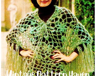 May include: A green crochet poncho with fringe. The poncho is made with a lacy stitch pattern and has a V-neck.