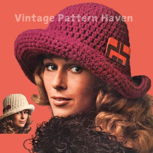 May include: A vintage crochet pattern for a wide-brimmed hat with a geometric design. The hat is made with a deep burgundy yarn and features a contrasting red and black geometric patch.