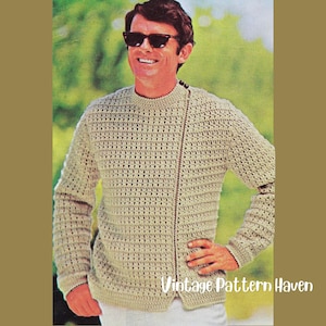 May include: A beige long-sleeved crochet sweater featuring a textured stitch pattern, a round neckline, and a diagonal front closure secured with two dark buttons. The garment has ribbed cuffs and a ribbed hem, with the text Vintage Pattern Haven.