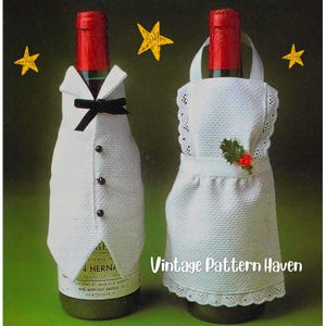 May include: Two wine bottle covers, one resembling a tuxedo with a black bow tie and buttons, the other a white apron with lace trim and a holly sprig. The bottles have red tops and are set against a green background with yellow star accents.