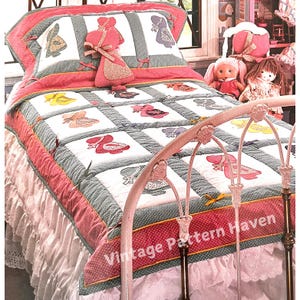 May include: A white and green patchwork quilt with a pink ruffle trim. The quilt features a pattern of little girls in dresses. The quilt is on a white metal bed frame with a pink headboard. The text "Vintage Pattern Haven" is visible in the lower right corner of the image.