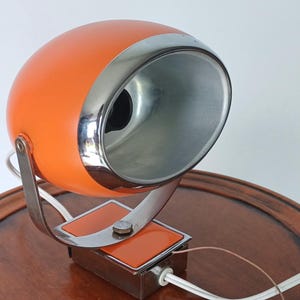 Orange Eyeball Space Age lamps from the 70s | Vintage adjustable Eyeball wall Lamps