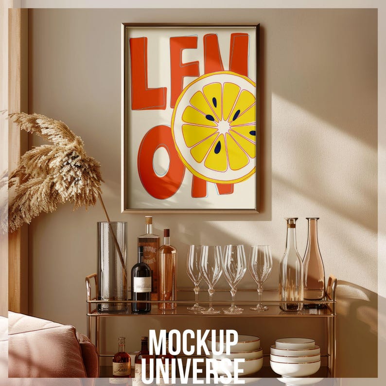 May include: A framed print with the text "Lemon On" in red and yellow letters, featuring a yellow lemon slice with a red outline. The print is hanging on a beige wall above a bar cart with bottles and glasses.