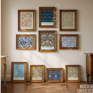 May include: Nine framed art prints featuring floral and patterned designs in various colors, including blue, red, and green. The prints are displayed on a white wall with a wooden floor. Each print is labeled "WILLIAM MORRIS" at the bottom.