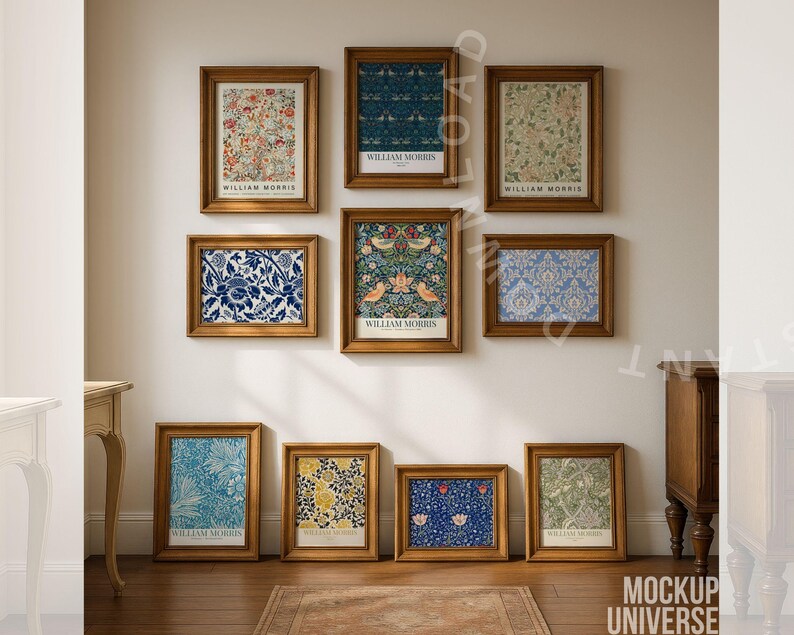 May include: Nine framed art prints featuring floral and patterned designs in various colors, including blue, red, and green. The prints are displayed on a white wall with a wooden floor. Each print is labeled "WILLIAM MORRIS" at the bottom.