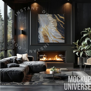 May include: A black sectional sofa with cream throw pillows sits in front of a fireplace with a black frame and a gold and white abstract painting above it. A potted plant and a black chair are in the corner of the room.