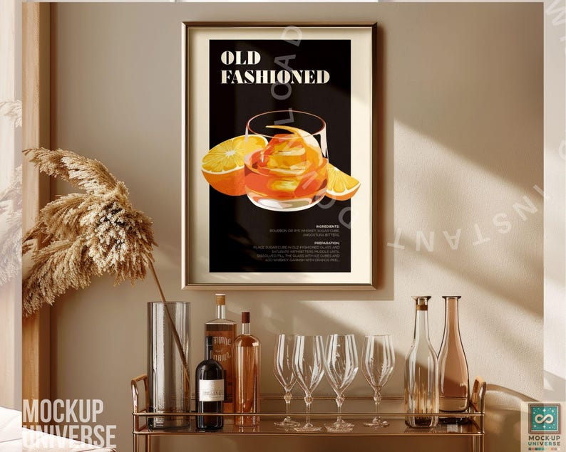May include: A framed poster with the text "Old Fashioned" and an illustration of an orange cocktail in a glass. The poster is hanging on a wall above a bar cart with bottles and glasses.