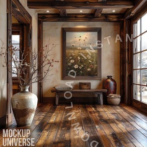 May include: A rustic living room with wooden beams, a large window, and a framed floral painting. A wooden bench sits in front of the painting, and a vase with dried branches sits on the floor.