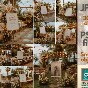 May include: A wedding sign mockup with a rustic theme. The sign is on a wooden easel and has a white background with black text. The text reads "Welcome to the Wedding on". The sign is surrounded by greenery and flowers.