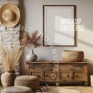 May include: A rustic wooden dresser with four drawers and a woven basket on top. The dresser is in a room with a straw hat, dried pampas grass, and a framed poster that says "MOCKUP UNIVERSE".
