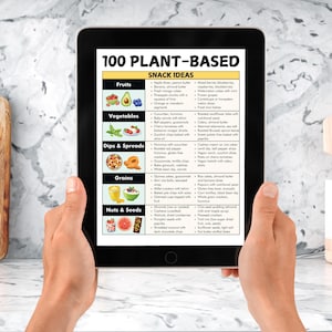 May include: A digital tablet displaying a list of 100 plant-based snack ideas, categorized by fruits, vegetables, dips & spreads, grains, and nuts & seeds.