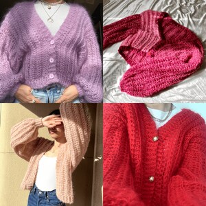 May include: Four different knitted cardigans in various colors, including purple, pink, beige, and red. The cardigans are all made with a soft, fluffy yarn and have a relaxed fit.