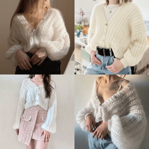May include: Four different models wearing a white fluffy cardigan with a button closure. The cardigan has a slightly cropped length and long sleeves with a puffed look.