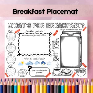 Peut inclure: Un set de table blanc pour le petit-déjeuner avec des dessins au trait noirs d'aliments pour le petit-déjeuner, dont des pommes, du bacon et une boîte de céréales. Le texte "WHAT'S FOR BREAKFAST?" et "Breakfast Placemat" sont en haut.