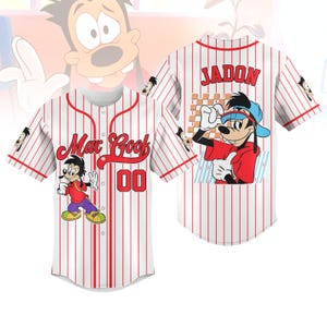 May include: White baseball jersey with red pinstripes, featuring Max Goof graphics and the name "Jadon" on the back. The front displays "Max Goof" in red script and the number "00". The jersey has short sleeves and a button-up front.