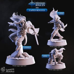 Può includere: Tre figurine in miniatura di furfanti con mantello. Le figurine sono in pose dinamiche, tra cui saltare per attaccare, duellante con la spada e posizione di potere. Il testo sull'immagine recita "Nightdagger Rogues 982 Caped Rogues". L'altezza delle figurine varia da 40 mm a 42 mm.
