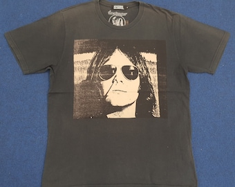 Camisetas vintage de The Stooges con glamour histérico
