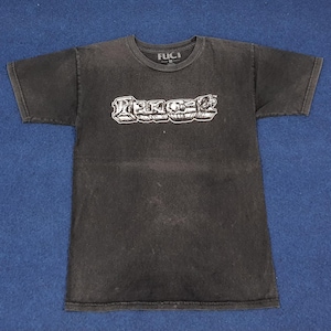 May include: Black t-shirt with a white graphic of the word "FUCCI" in a stylized font.